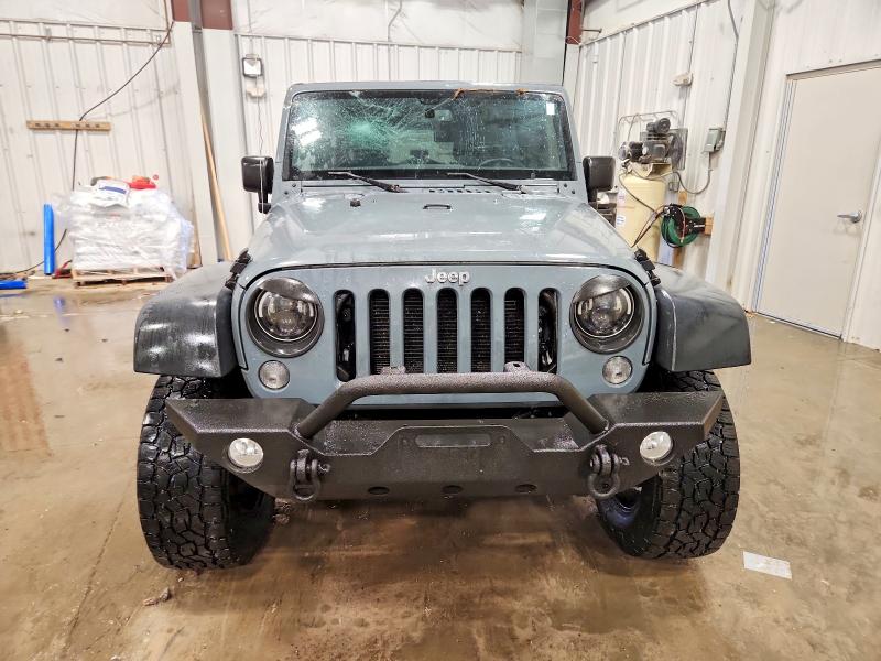 Photo 5 from auction – 2015 JEEP WRANGLER U with VIN 1C4BJWDG4FL571899