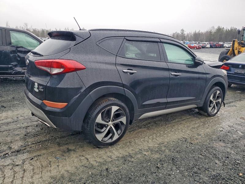 Photo 3 from auction – 2017 HYUNDAI TUCSON LIM with VIN KM8J3CA29HU268915