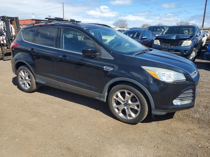 Photo 4 from auction – 2016 FORD ESCAPE with VIN 1FMCU0G98GUC12410