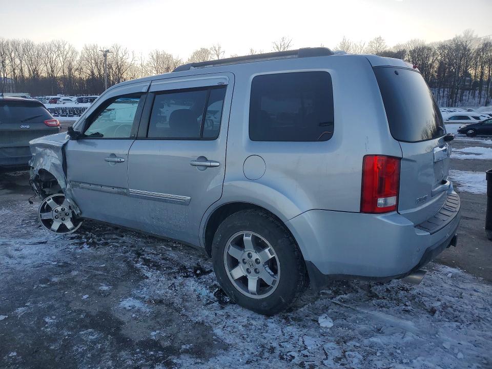 Photo 2 from auction – 2010 HONDA PILOT TOUR with VIN 5FNYF4H93AB027983