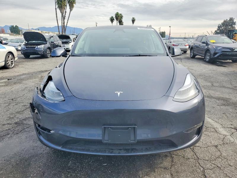 Photo 5 from auction – 2023 TESLA MODEL Y with VIN 7SAYGDED9PF978920