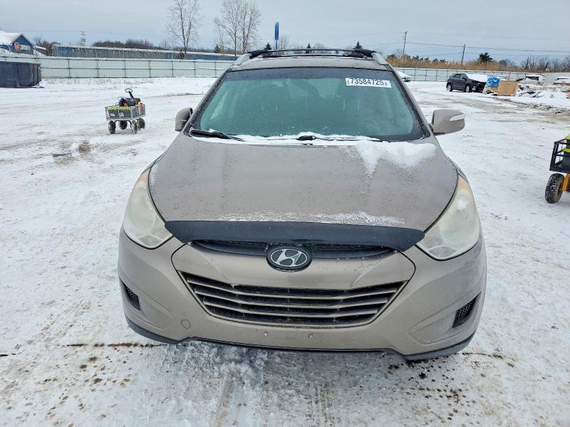 Photo 5 from auction – 2012 HYUNDAI TUCSON GLS with VIN KM8JUCAC3CU395576