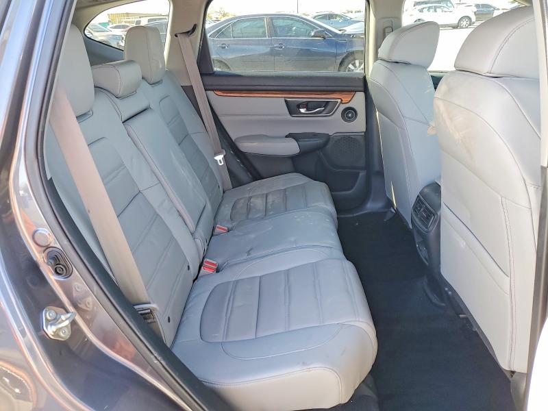 Photo 11 from auction – 2018 HONDA CR-V with VIN 7FARW1H86JE021397