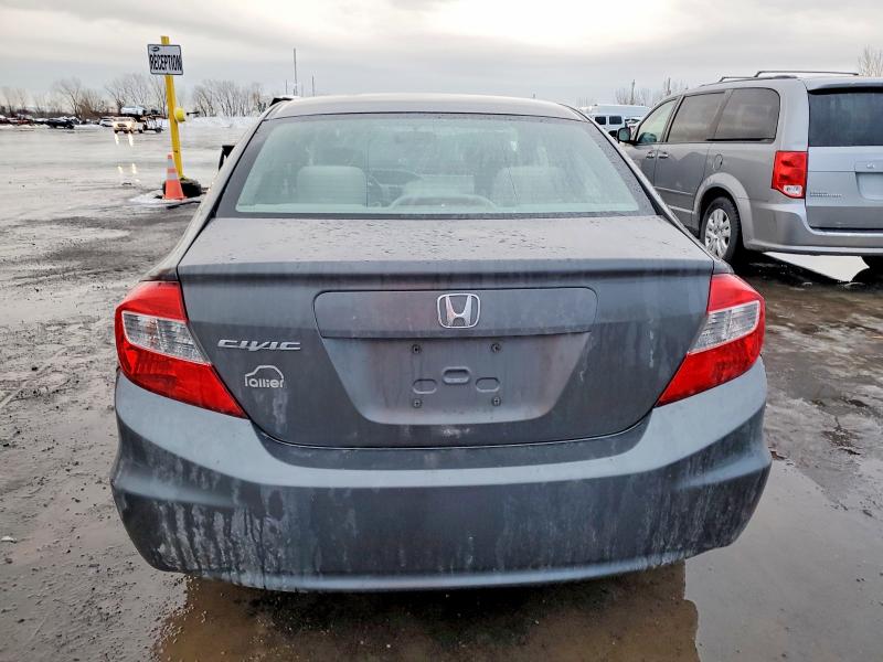 Photo 6 from auction – 2012 HONDA CIVIC LX with VIN 2HGFB2F49CH053274