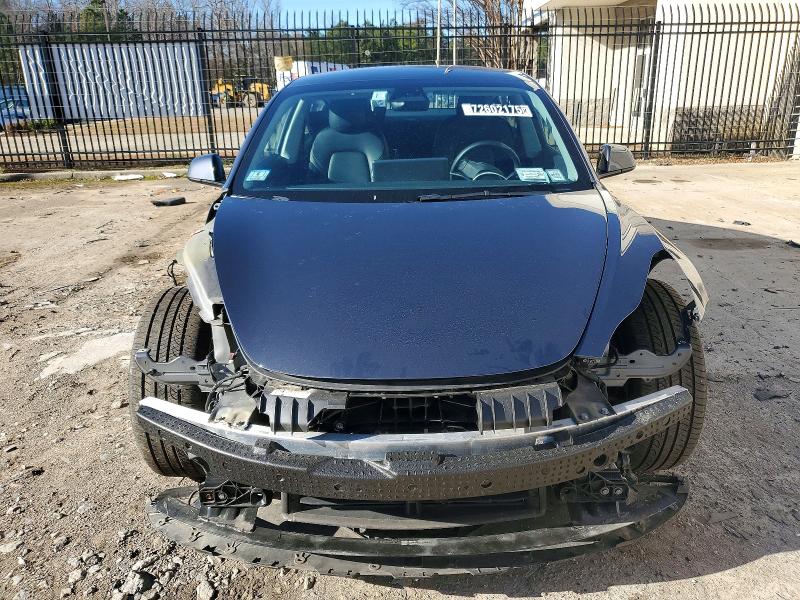 Photo 5 from auction – 2022 TESLA MODEL 3 with VIN 5YJ3E1EB2NF291365