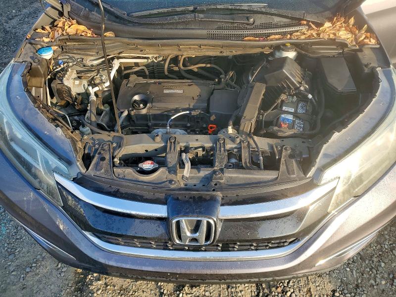 Photo 12 from auction – 2016 HONDA CR-V with VIN 2HKRM3H75GH544263