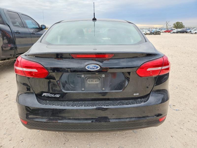 Photo 6 from auction – 2018 FORD FOCUS SE with VIN 1FADP3F2XJL262069