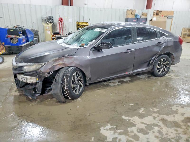 HONDA CIVIC 2017 with VIN 19XFC2F74HE008364 - Photo from auction