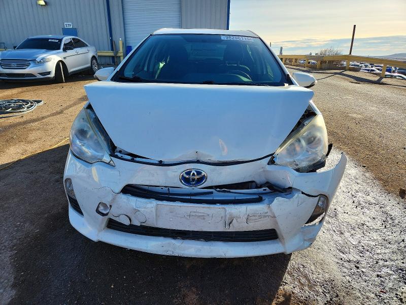 Photo 5 from auction – 2013 TOYOTA PRIUS C with VIN JTDKDTB3XD1547895