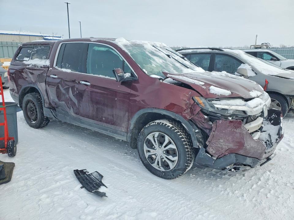 Photo 4 from auction – 2020 HONDA RIDGELINE with VIN 5FPYK3F74LB501246