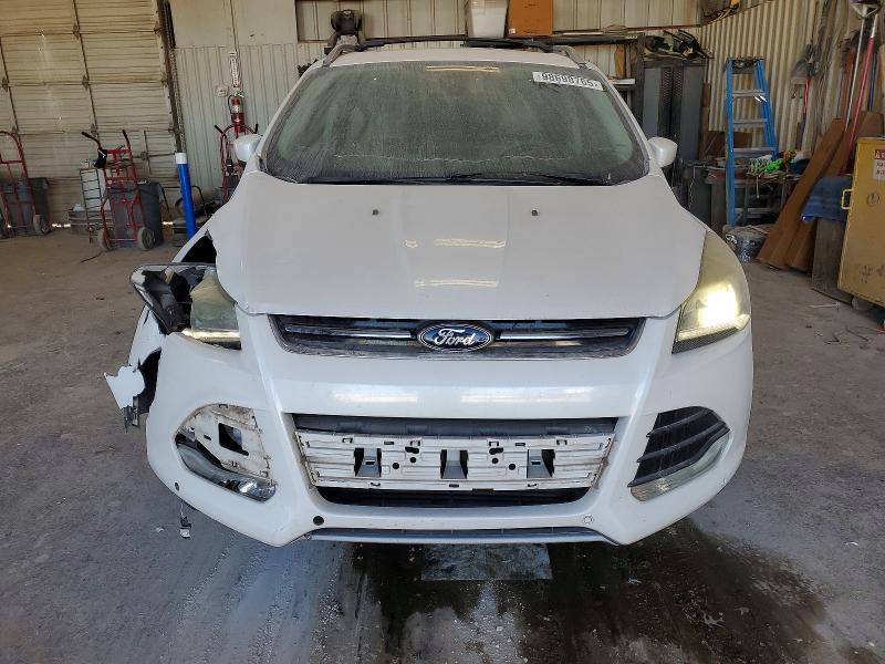 Photo 5 from auction – 2015 FORD ESCAPE with VIN 1FMCU0J98FUA61043