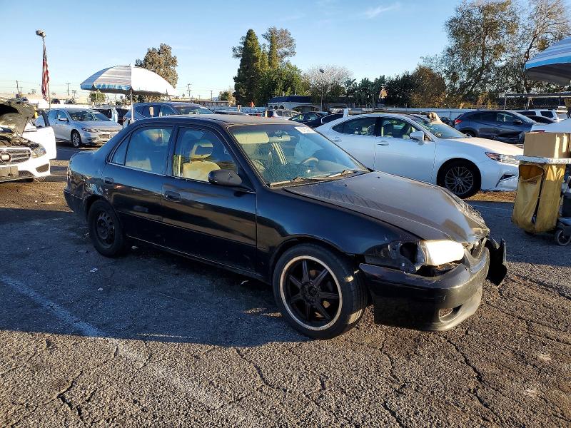 Photo 4 from auction – 2002 TOYOTA COROLLA CE with VIN 1NXBR12E72Z638198