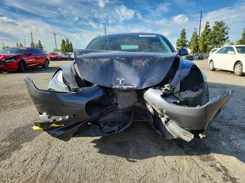 Photo 5 from auction – 2023 TESLA MODEL 3 with VIN 5YJ3E1EAXPF616161
