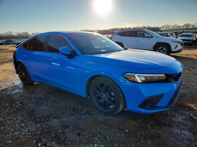 Photo 4 from auction – 2023 HONDA CIVIC SPOR with VIN 19XFL1H89PE014255