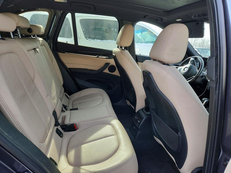 Photo 11 from auction – 2016 BMW X1 with VIN WBXHT3Z3XG4A50812