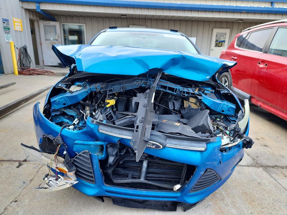 Photo 5 from auction – 2014 FORD FOCUS SE with VIN 1FADP3F20EL368200