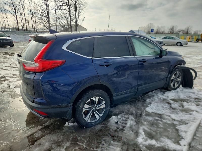 Photo 3 from auction – 2017 HONDA CR-V with VIN 2HKRW1H39HH001155