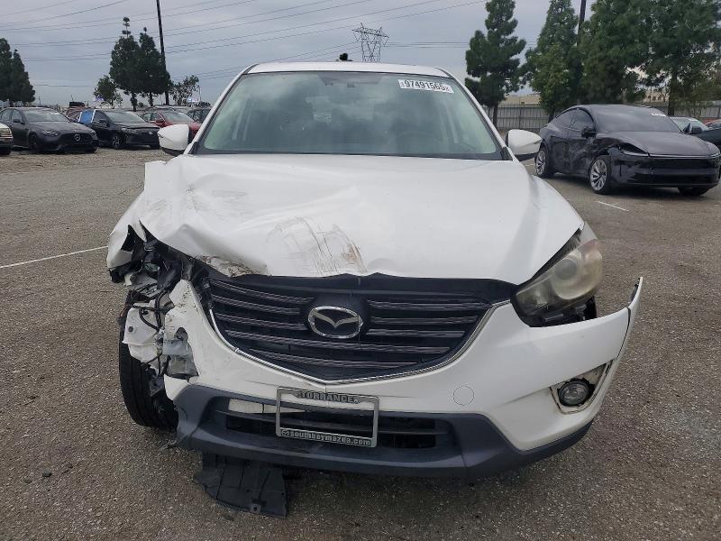 Photo 5 from auction – 2016 MAZDA CX-5 with VIN JM3KE2DY9G0807107