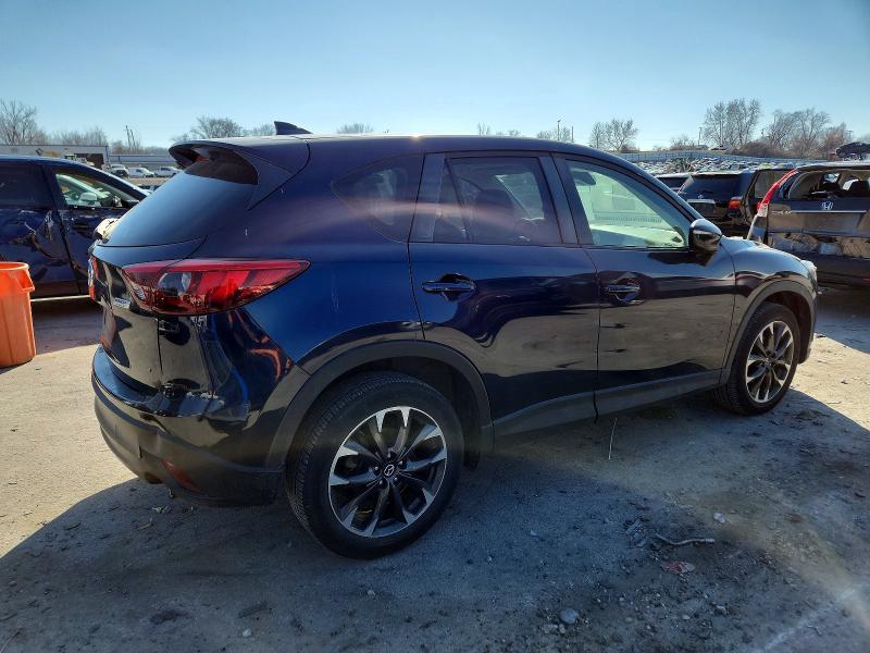 Photo 3 from auction – 2016 MAZDA CX-5 GT with VIN JM3KE2DY6G0701245