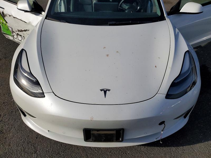 Photo 11 from auction – 2022 TESLA MODEL 3 with VIN 5YJ3E1EAXNF326953