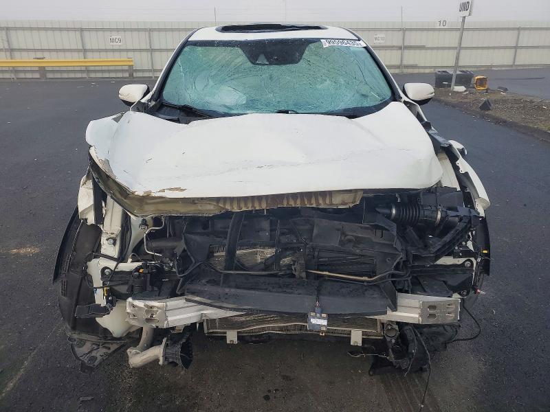 Photo 5 from auction – 2018 HONDA CR-V with VIN 2HKRW2H81JH687957
