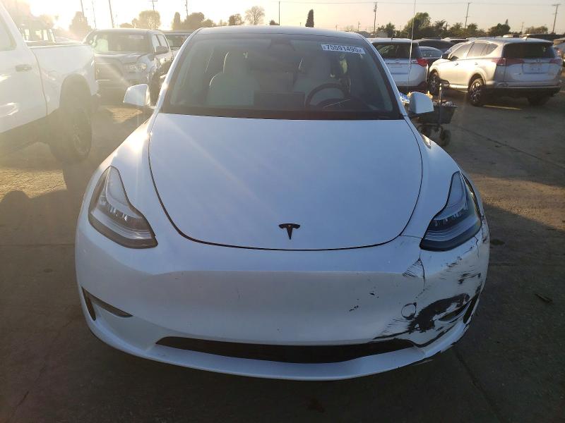 Photo 5 from auction – 2023 TESLA MODEL Y with VIN 7SAYGDEE2PA085770