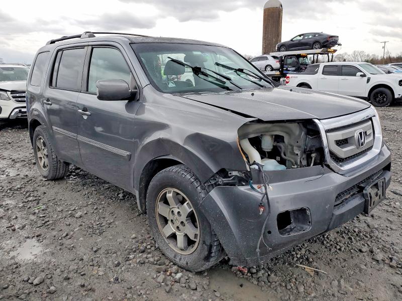 Photo 4 from auction – 2010 HONDA PILOT TOUR with VIN 5FNYF4H93AB021908