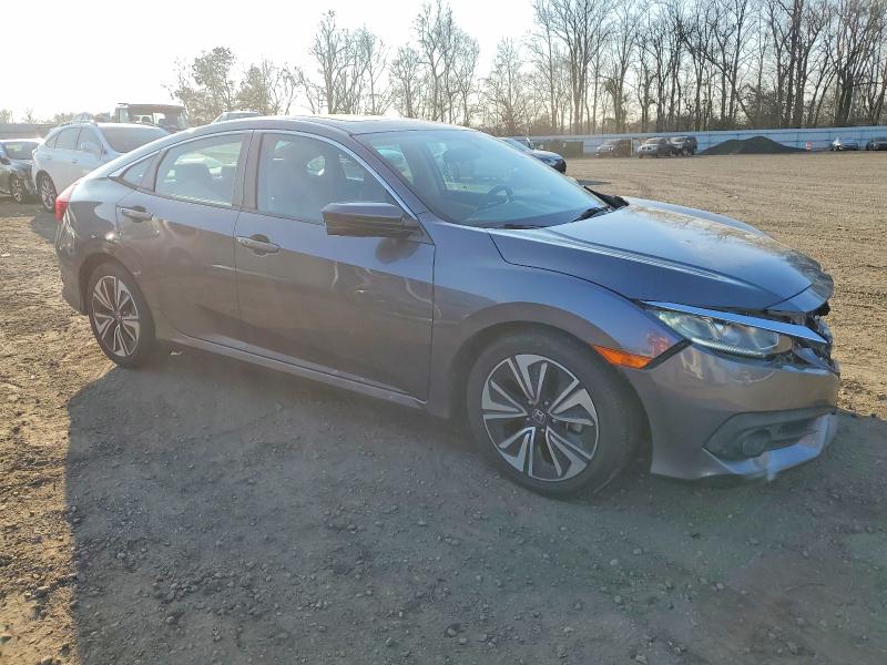 Photo 4 from auction – 2017 HONDA CIVIC EX with VIN 19XFC1F34HE202805