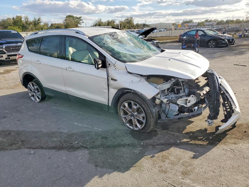 Photo 4 from auction – 2014 FORD ESCAPE with VIN 1FMCU0J94EUE34416