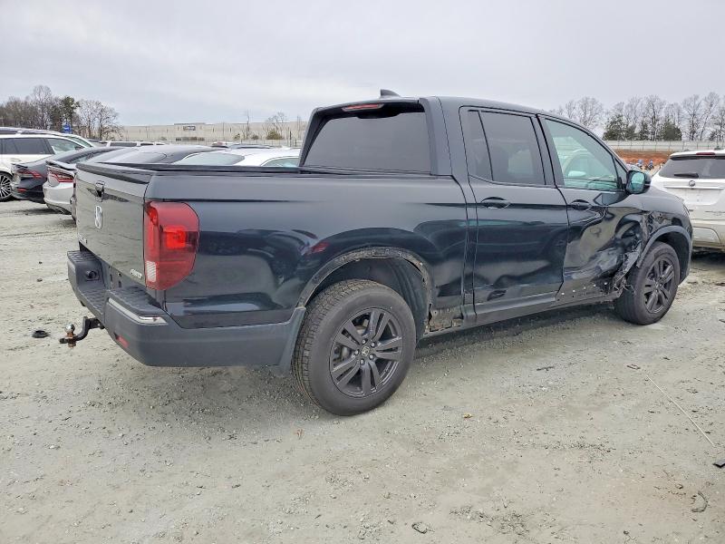 Photo 3 from auction – 2018 HONDA RIDGELINE with VIN 5FPYK3F15JB016266