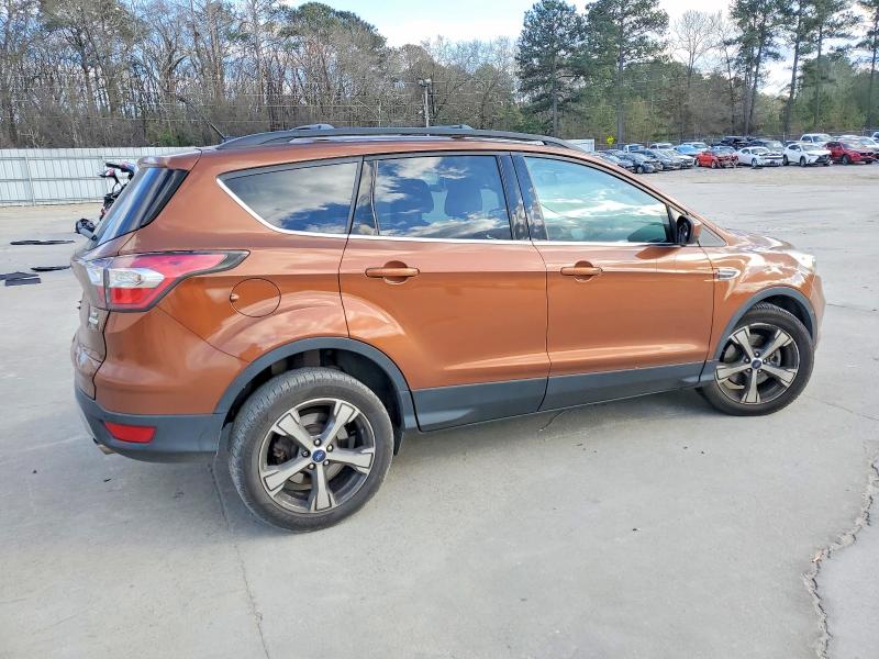 Photo 3 from auction – 2017 FORD ESCAPE with VIN 1FMCU0G99HUB36309