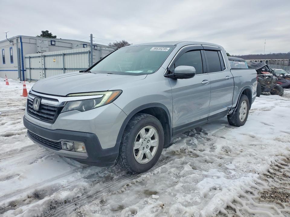 HONDA RIDGELINE 2017 with VIN 5FPYK3F79HB033876 - Photo from auction
