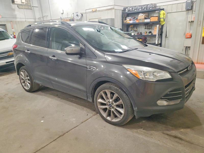 Photo 4 from auction – 2015 FORD ESCAPE with VIN 1FMCU9GX0FUC77723