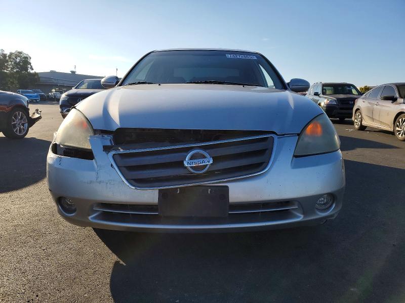 Photo 5 from auction – 2002 NISSAN ALTIMA SE with VIN 1N4BL11E72C227385