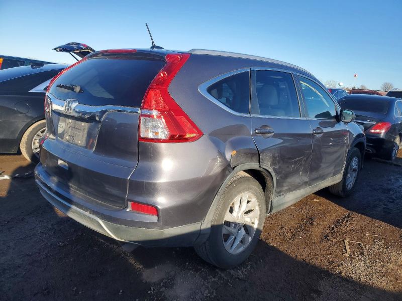 Photo 3 from auction – 2015 HONDA CR-V with VIN 2HKRM3H77FH501798