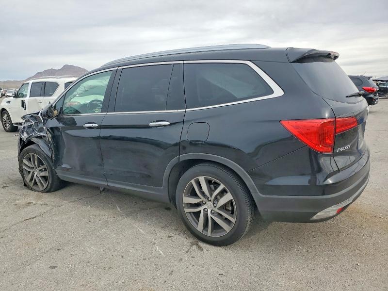 Photo 2 from auction – 2016 HONDA PILOT with VIN 5FNYF5H96GB044288