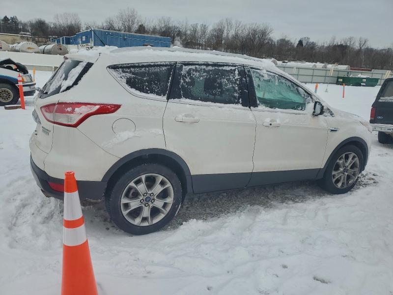 Photo 3 from auction – 2016 FORD ESCAPE TIT with VIN 1FMCU0JX2GUA19502
