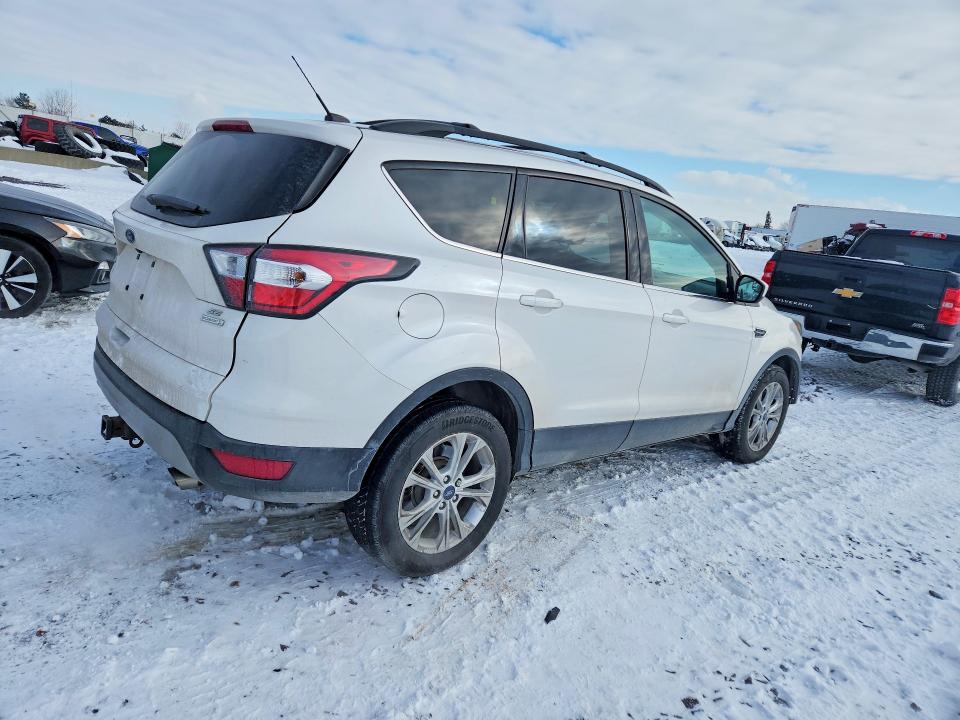 Photo 3 from auction – 2017 FORD ESCAPE SE with VIN 1FMCU0G92HUA55054