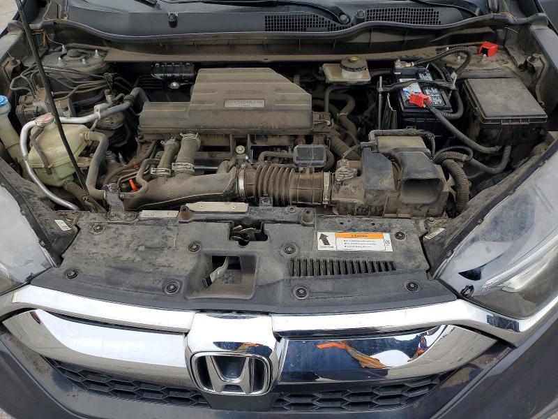 Photo 11 from auction – 2018 HONDA CR-V with VIN 7FARW1H52JE053270