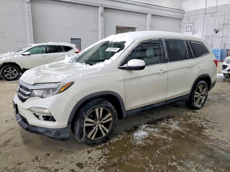 HONDA PILOT 2017 with VIN 5FNYF5H35HB012140 - Photo from auction