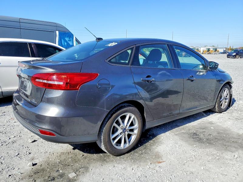 Photo 3 from auction – 2015 FORD FOCUS SE with VIN 1FADP3F24FL211481