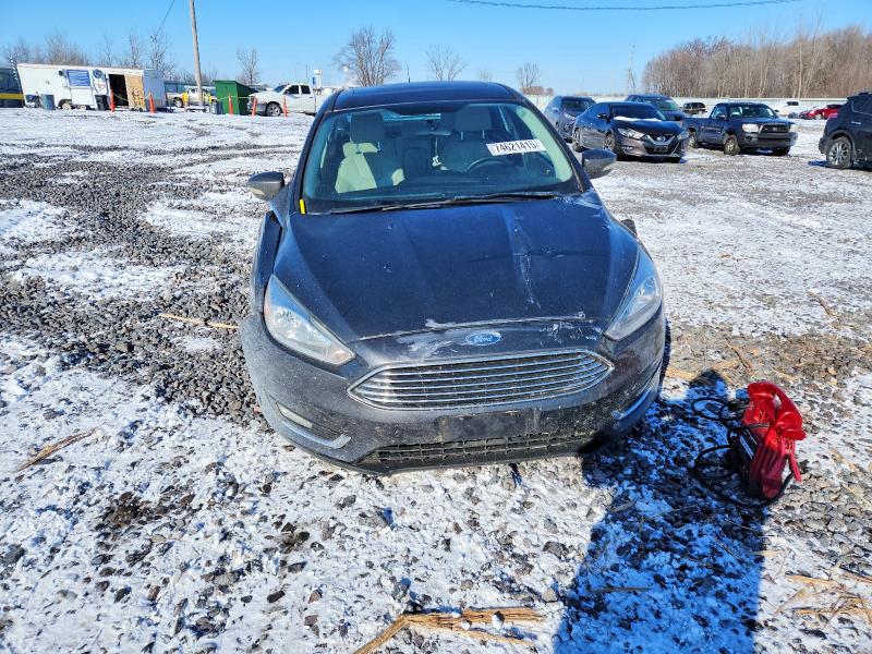 Photo 5 from auction – 2018 FORD FOCUS with VIN 1FADP3J27JL250128