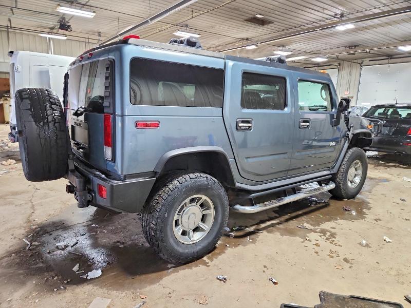 Photo 3 from auction – 2006 HUMMER H2 with VIN 5GRGN23U46H121214