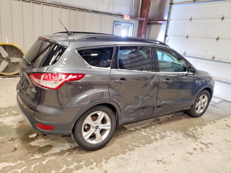 Photo 3 from auction – 2016 FORD ESCAPE SE with VIN 1FMCU9GX8GUB56973