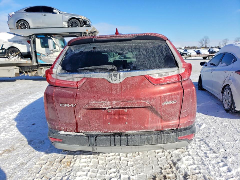 Photo 6 from auction – 2017 HONDA CR-V with VIN 2HKRW2H52HH128532