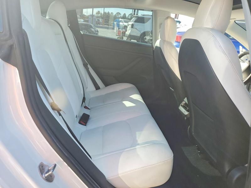 Photo 11 from auction – 2022 TESLA MODEL 3 with VIN 5YJ3E1EA0NF153542