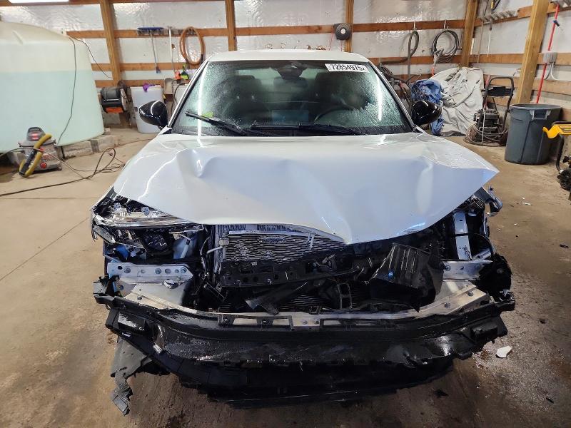 Photo 5 from auction – 2023 HONDA CIVIC SPOR with VIN 2HGFE2F5XPH532292