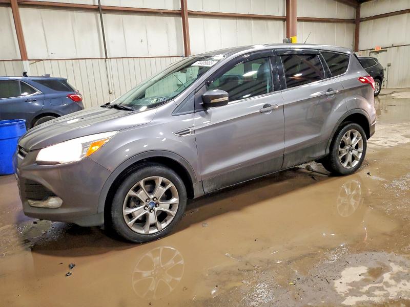 FORD ESCAPE SEL 2013 with VIN 1FMCU9HX8DUB65652 - Photo from auction