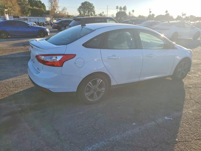 Photo 3 from auction – 2014 FORD FOCUS SE with VIN 1FADP3F24EL406379