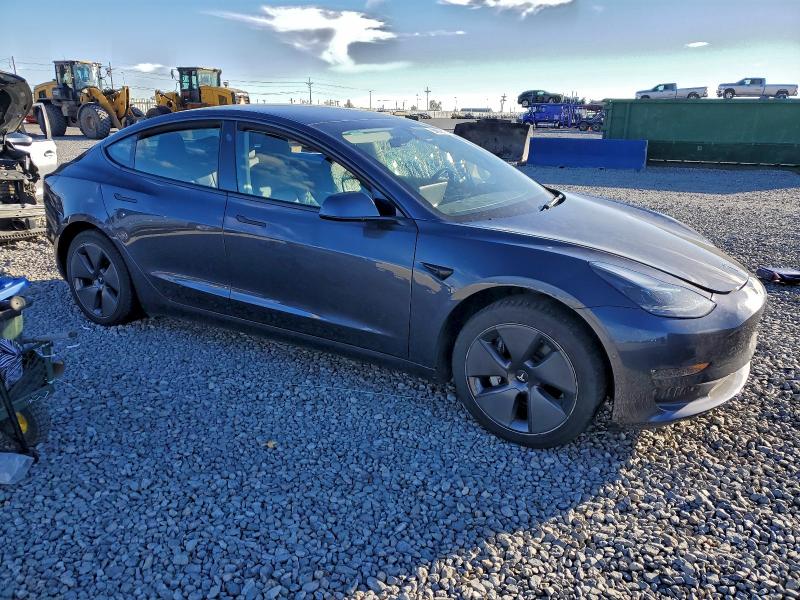 Photo 4 from auction – 2022 TESLA MODEL 3 with VIN 5YJ3E1EB2NF195557